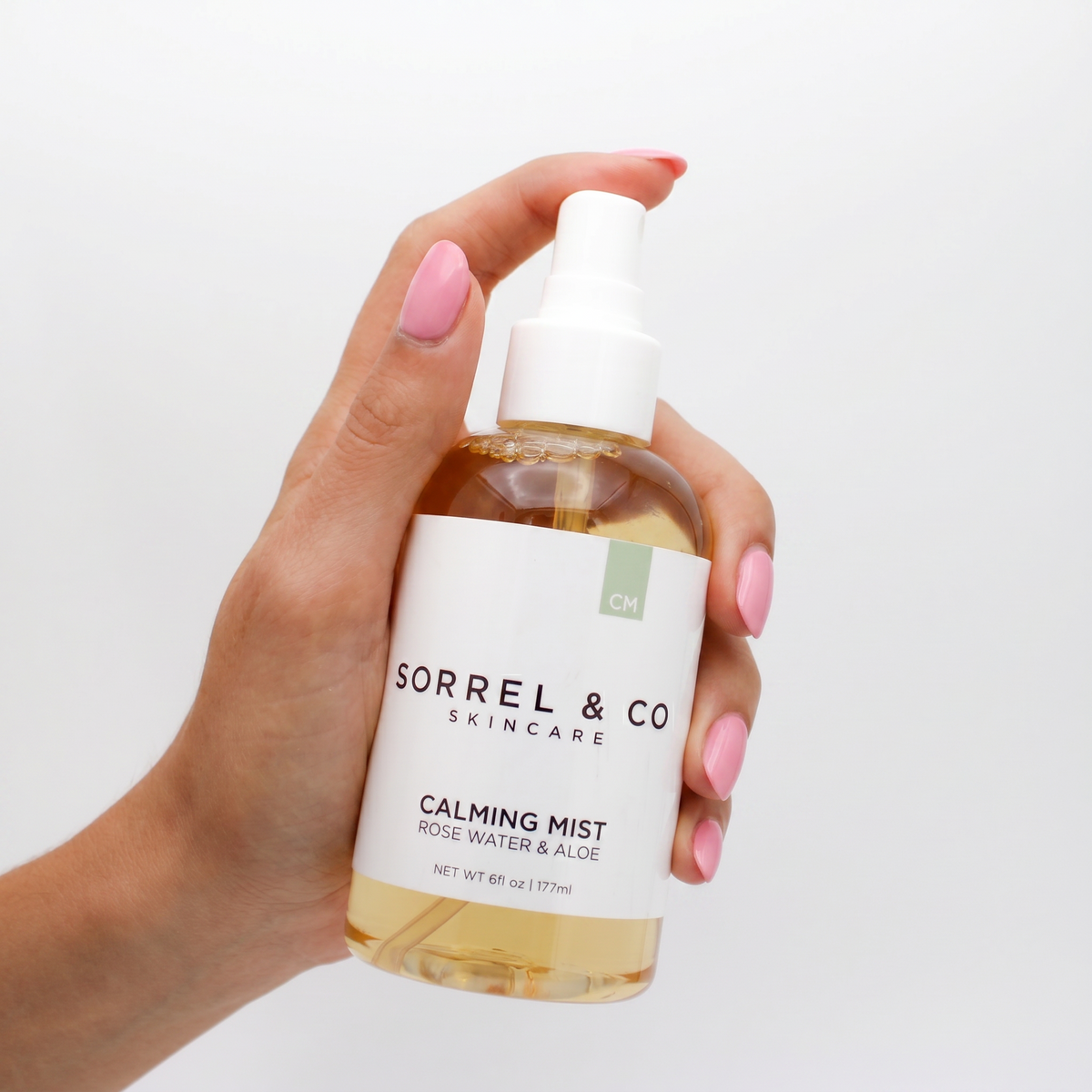 Calming Mist with Rose Water & Aloe held in hand