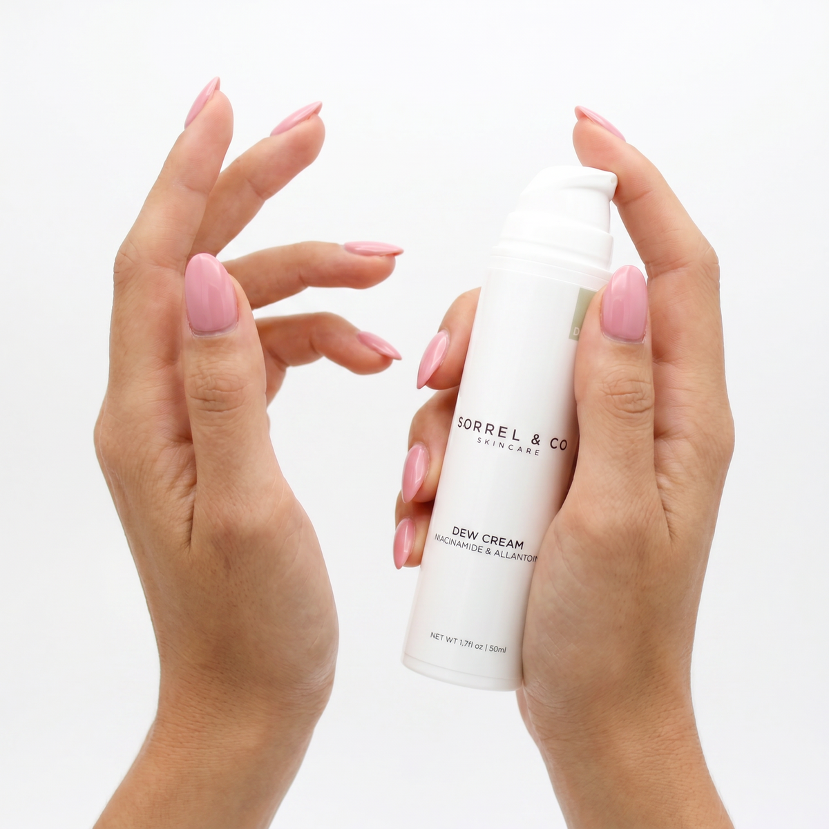 Dew Cream with Niacinamide & Allantoin held in hand