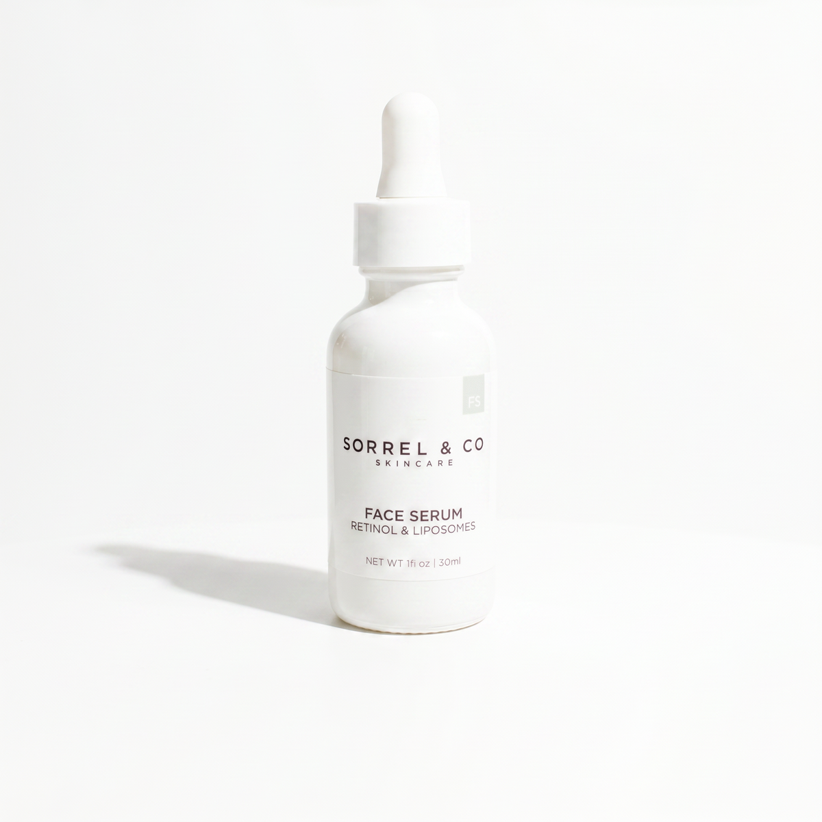 Face Serum with Retinol & Liposomes on a white background