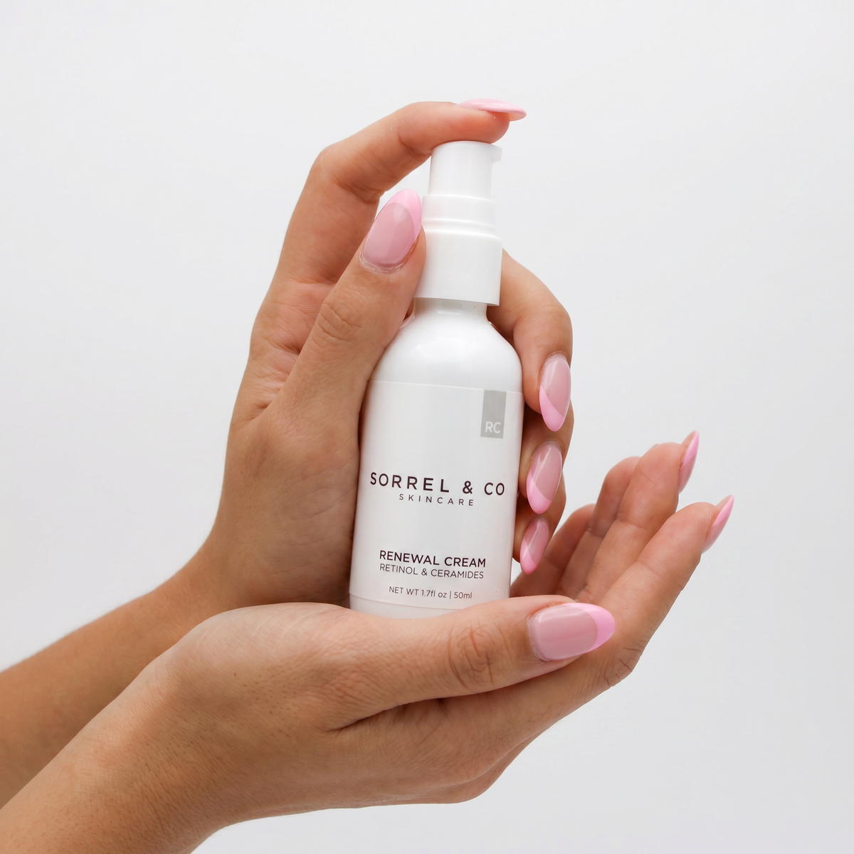 Renewal Cream with Retinol & Ceramides held in hand